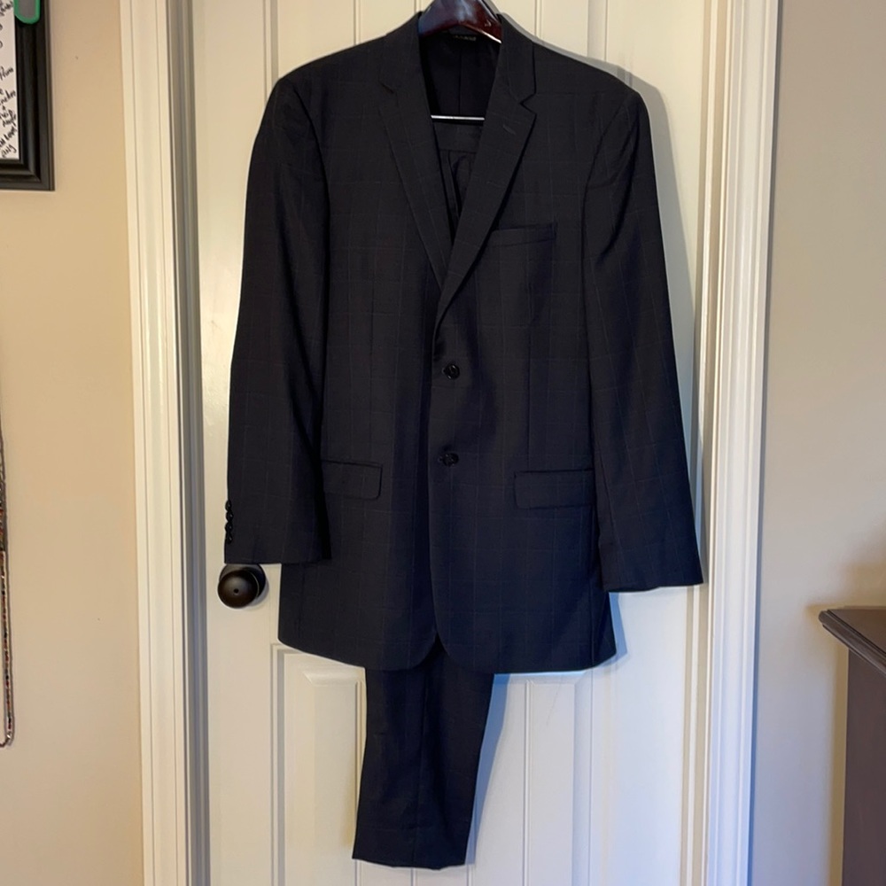 NWOT Jos.A.Bank Traveler’s Collection Navy Pinstripe Suit. New, never worn.